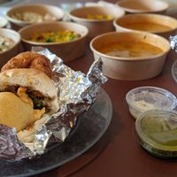 A feast! Medu Vada (savoury doughnuts) are fantastic! Comes with delicious lentil stew. So much Vegan fooood! at Shree Krishna Vada Pav - Vauxhall in South West London