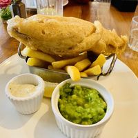 Huge piece of delicious banana blossom and chips!😋  at The Bridport Arms in Bridport