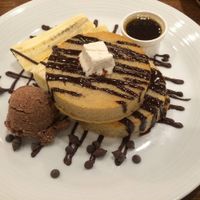 Pancakes with 'butter', maple syrup, bananas, brown rice ice cream and chocolate sauce.  at CHOICE in Kyoto