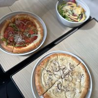 Pizzas and the saladd  at CHOICE in Kyoto