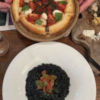 Pizza and charcoal risotto   at CHOICE in Kyoto