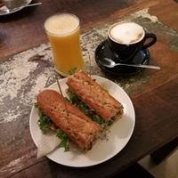 Grilled tofu sandwich, orange juice and coffee with soy milk at El Cafe Blueproject in Barcelona