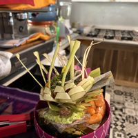 Her beautiful ritual (sometimes they close because of their ritual and you will only see that they are closed if you get there😅)  at Vegan Soul Cafe in Penida Island