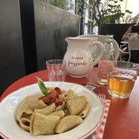 Paccheri with pistachios pesto, confit cherry tomatoes, plant-based stracciatella and pepper  at Mi Scusi in Bergamo