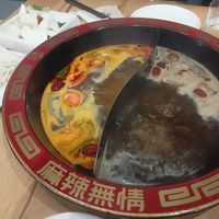 Tomato and mushroom stock at Restaurante Spicy Soul Hotpot in Sevilla