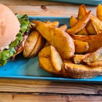 Double Smack burger with potato wedges at Hank Cuisine Végétale - Archives in Paris