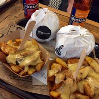 Fries with melted vegan cheese at Hank Cuisine Végétale - Archives in Paris