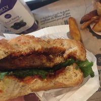 Burger, potatoes and açaï juice. at Hank Cuisine Végétale - Archives in Paris