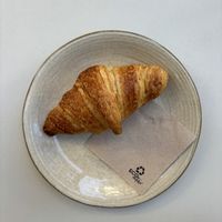 The croissants (and all of the deserts/pastries) are unbelievably good. I have never had such good vegan pastries in my life! I would also recommend the strawberry croissant!   at Let It Bloom in Valencia