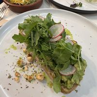 AVO toast + tofu scrambled + tomato toast  at Let It Bloom in Valencia