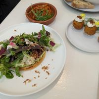 Arepa, kimchi and croquettes at Let It Bloom in Valencia