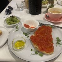 Spanish toast with extra avocado and an oat milk cappuccino   at Let It Bloom in Valencia