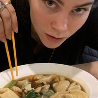 Liv with her dumpling soup   at Sunflower Thai Vegetarian Restaurant in Auckland