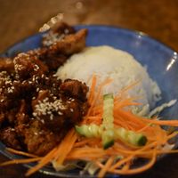 Spicy crispy chicken on rice at Sunflower Thai Vegetarian Restaurant in Auckland