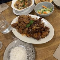 Vegan chicken platter, side of steamed veggies, noodle soup, and tofu.   at Sunflower Thai Vegetarian Restaurant in Auckland