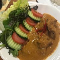 “Chicken” with peanut sauce and salad. at Sunflower Thai Vegetarian Restaurant in Auckland