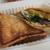 Fried green tomato sandwich on toast at La Tour Cafe - Nimitz Hwy in Honolulu