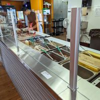 Updated serving area with glass shields in place at Silantra Asian Street Kitchen in Camp Hill