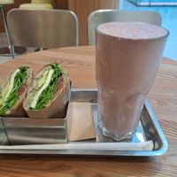 The Sir Pesto sandwich with the Strawberry Milkshake smoothie at Plants By Us in Helsinki