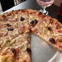 Vegan cheese pizza with olives, onions & artichokes    at Fire on Fifth in Peru