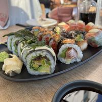 The roll in front - the Unami roll - is the best sushi roll I’ve ever had!   at Sushi Momo in Toronto