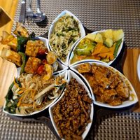 Vegan platter with tempeh and tofu dishes. at Garlic Restaurant Bali in Nusa Dua