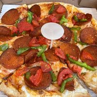 Vegan pizza with pepperoni at Pizza Pizza - Notre Dame in Montreal