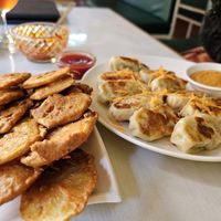 Potato pakoda and kothey veg momo at Annapurna Veg & Vegan Restaurant in Kathmandu