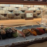 Amazing different tastes in the 10-piece sushi platter. The pickled ginger wasn't too exciting, and I didn't like the fake roe. But everything else was good! at Shojin Sushi Minamo in Osaka