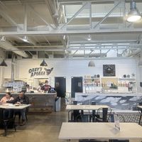 Counter service within market  at Ozzy's Apizza - Food Stand in New Haven