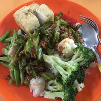 generous portions. Four side dishes cost about $3.50 at YouSheng Vegetarian 祐生素食 in East Singapore