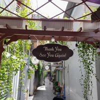 Walking outside at Chạm Vegetarian & Coffee in Ho Chi Minh City