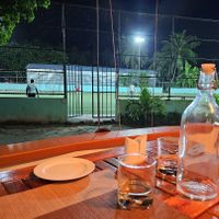 Enjoy the breeze and the locals playing football. at Aveli Restaurant in Dhigurah