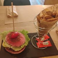 Vegan burger and potato wedges at O Sorriso in Porto Covo