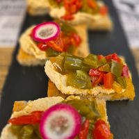 Bruschetta with hummus and roasted bell peppers at O Sorriso in Porto Covo