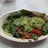 Veggie salad bowl with black/pinto beans, rice, fajita veggies, and guacamole at Chipotle - W Dickson St in Fayetteville