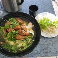 Stew soybean based pork intestine yellow noodle soup + green onion (extra $1) at World Vegan in Cabramatta