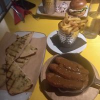 Garlic bread, vegan breaded chicken and fries at Jolly Postie in Royston