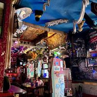 Eclectic decor of the pub   at Happy Fish at The Dog House in Edinburgh