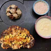 Bumba Cauliflower Steak marinated in spice blend w/
Sarawak black peppercorn, crushed dried curry leaf, stuffed
with charred red bell pepper w/spices, &  avocado mushroom terrine at Manja in Kuala Lumpur