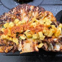 Bumba Cauliflower Steak marinated in spice blend w/
Sarawak black peppercorn, crushed dried curry leaf, stuffed
with charred red bell pepper w/spices, &  avocado mushroom terrine at Manja in Kuala Lumpur