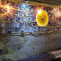 wall of reviews at De Waroeng Labuan Bajo in 