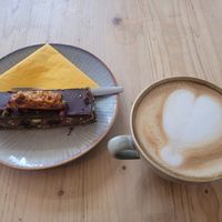 Vegan Honeycomb, Pistachio + Cranberry Tiffin and Oat Latte at Becws Melyn in Llanberis