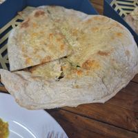 Cheesy naan at Hasan Indian Restaurant in Pakse
