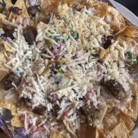 Vegan nachos with what I think was crumbled up black bean patties. Can’t show the topping because they served it with sour cream.   at Stray Dog in Minneapolis