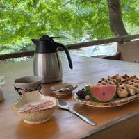 Delicious vegan waffles with almond yoghurt and fruit for breakfast. at Earth Hostel - Nikko Riverhouse in Nikko