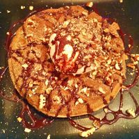 The Chaffle✨ Churro waffle topped w/ vanilla ice cream, chocolate sauce. Absolutely Delicious! at Seabirds Kitchen - The LAB in Costa Mesa