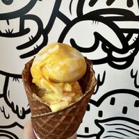 Mango sticky rice and pineapple POG in a waffle cone!  at Stella Jean's Ice Cream - The Lab in Costa Mesa