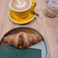 Vegan croissant & oatmilk latte at Zili's Health Bar in Budapest
