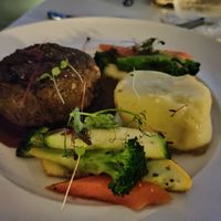 Lentil 'steak' with vegetables at Elements Restaurant in Oranjestad